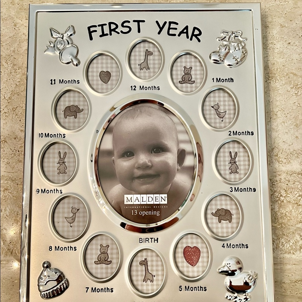 Baby’s First Year picture frame. Silver mental. Brand new. 8x10.